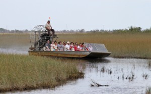 Tourists in the Florida Everglades about to be bit by genetically modified mosquitoes